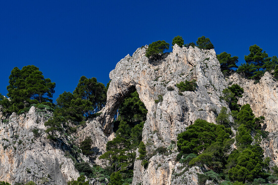 Arco Naturale or Natural Arch, a stone arch high on the cliffs of the island of Capri, Italy.