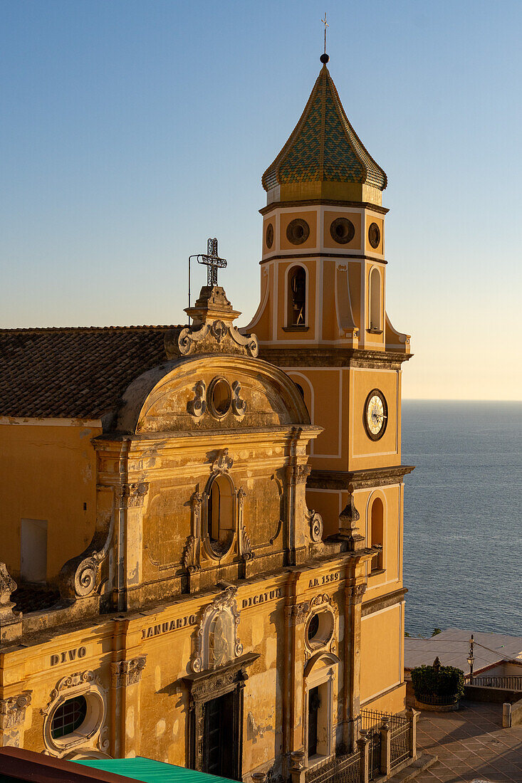 Golden sunset light on the Church of San Gennaro in Vettica Maggiore, Praiano, Italy.