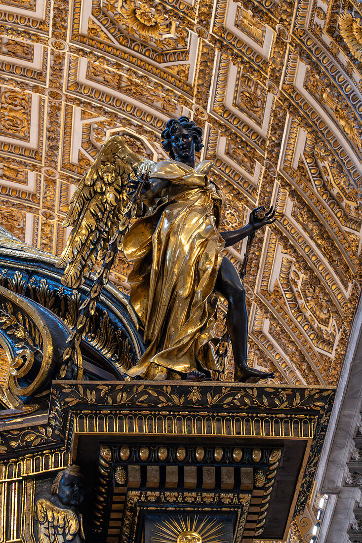 Statue of an angel on Bernini's Baldachin in St. Peter's Basilica, Vatican City, Rome, Italy.