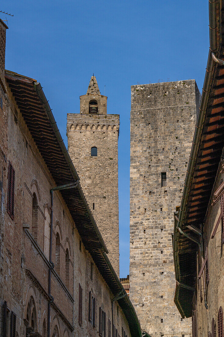 Torre Grossa, left, and Torre dei Cugnanesi in the medieval walled town of San Gimignano, Italy.