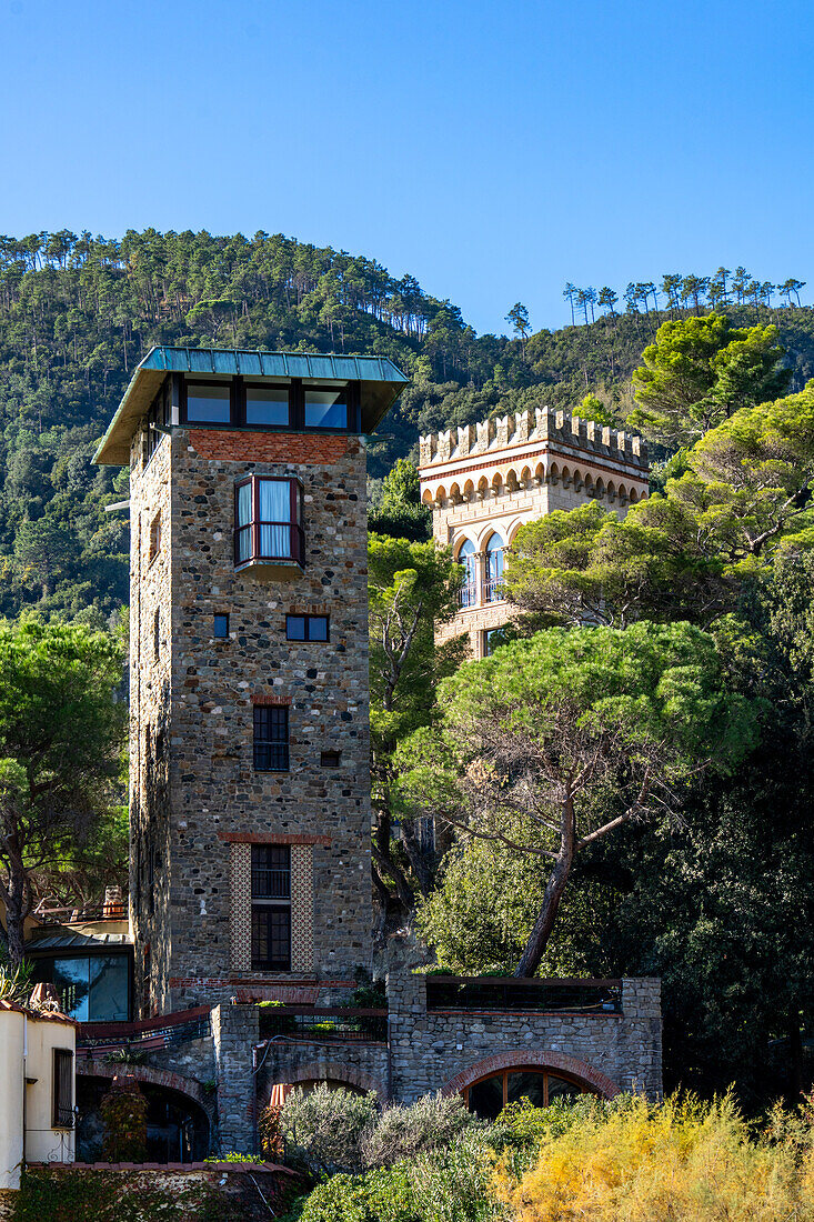 Old stone towers renovated for modern living in Monterosso al Mare, Cinque Terre, Italy.