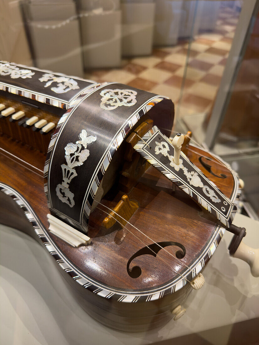 Detail of the ivory inlay on an antique hurdy-gurdy in the Accademia Gallery in Florence, Italy. Circa 1775.