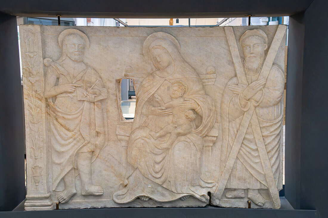 A marble bas relief of the Virgin and Child in the Diocesan Museum of Amalfi, Italy. This museum is housed in the Basilica of the Crucifix, adjacent to the Amalfi Duomo.