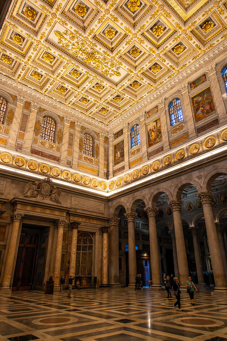 The ornate ceiling of the transept of the Basilica of St. Paul Outside the Walls, Rome, Italy.