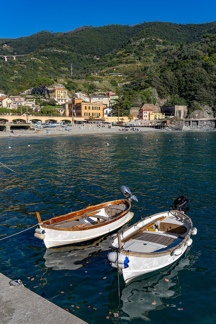 Two small fishing boats in the harbor of Monterosso al Mare, Cinque Terre, Italy.