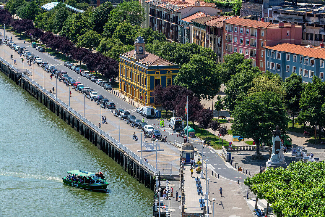 Portugalete town and El Gasolino boat, small boat carrying passengers across the River Nervion, between Portugalete and Las Arenas, Getxo, Vizcaya, Pais Vasco, Spain