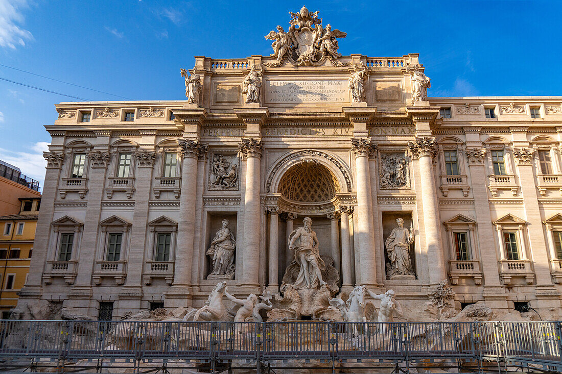 The Trevi Fountain on the rear of the Palazzo Poli in the Piazza di Trevi in Rome, Italy. The fountain is undergoing restoration in this image.