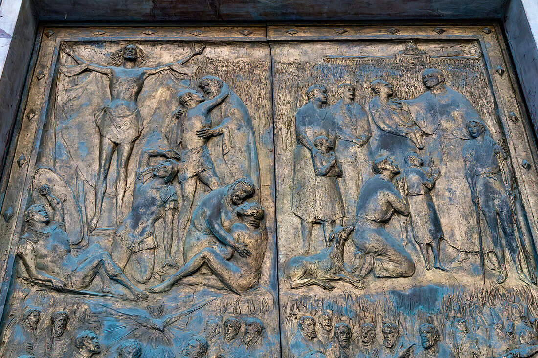 Detail of the gilded bronze Holy Door of the Basilica of St. Paul Outside the Walls, Rome, Italy. The Holy Door is opened only on Jubilee years.