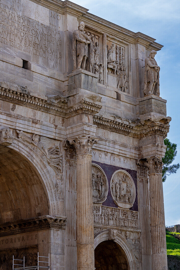 Detail of the Arch of Constantine, a triumphal arch in the Colosseum Archeological Park in Rome, Italy.