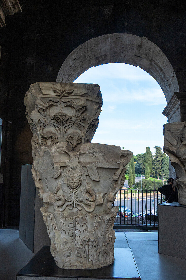 Figured Corinithian capital with a Gorgon originally from Attica, Greece in the Colosseum. Rome, Italy. Used as decoration in the top level of the Colosseum.