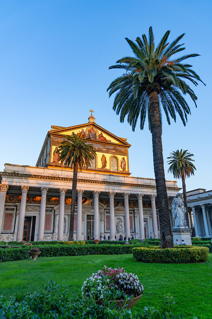 The statue of St. Paul and facade of the Basilica of St. Paul Outside the Walls, Rome, Italy.