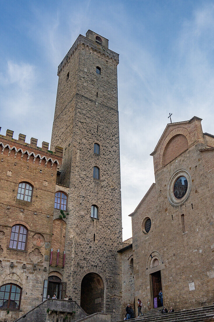 Facade of the Palazzo Comunale, Torre Grossa & Collegiata di Santa Maria Assunta Church. San Gimingnano, Italy.