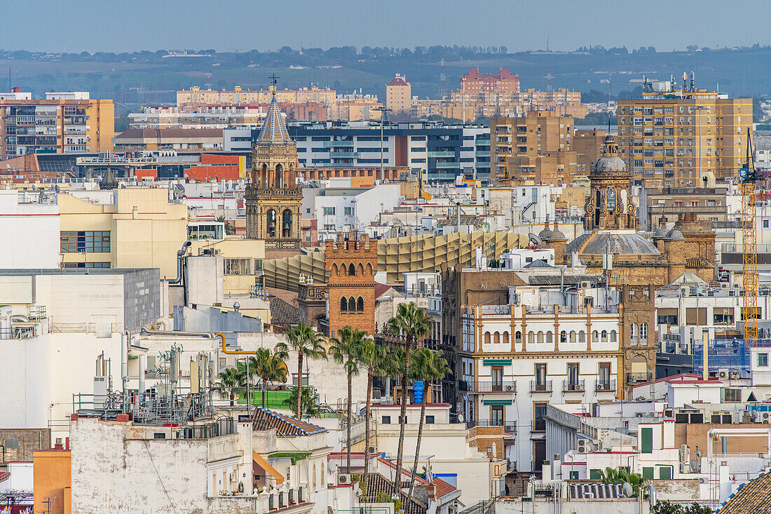 Skyline of Seville blending historical landmarks with contemporary buildings and city landscapes.