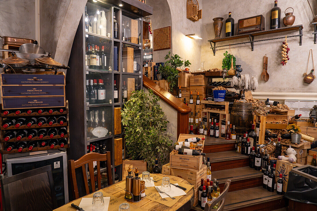 Rustic decor in a restaurant serving typical Tuscan cuisine in Florence, Italy.