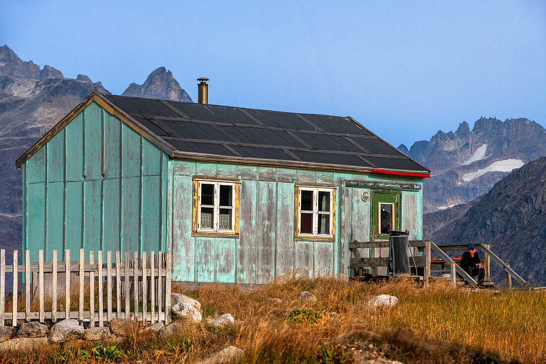 Coloful houses in the small isolated inuit village of Aappilattoq, South Greenland, Arctic sea.