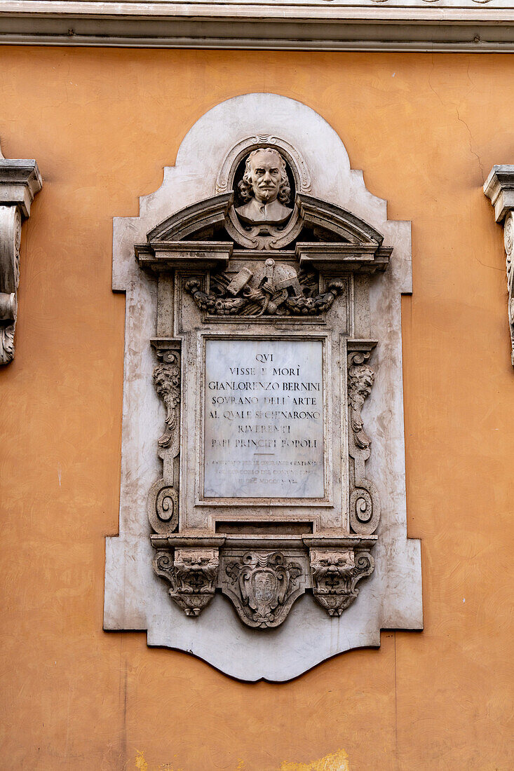 A memorial to sculptor Gian Lorenzo Bernini on the facade of the historic Bernini House in Rome, Italy.