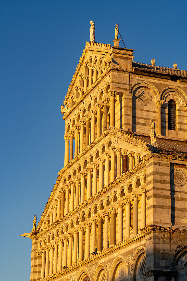 The west facade of the Pisa Duomo or Primatial Metropolitan Cathedral of the Assumption of Mary in Pisa, Italy.