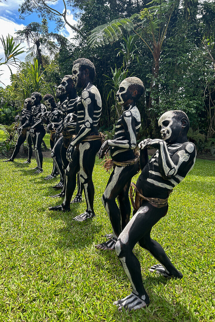 The Skeleton Men from the Omo Bugamo tribe of Papua New Guinea paint their bodies with black and white paint emulating the human skeleton, Chimbu Province, Papua New Guinea