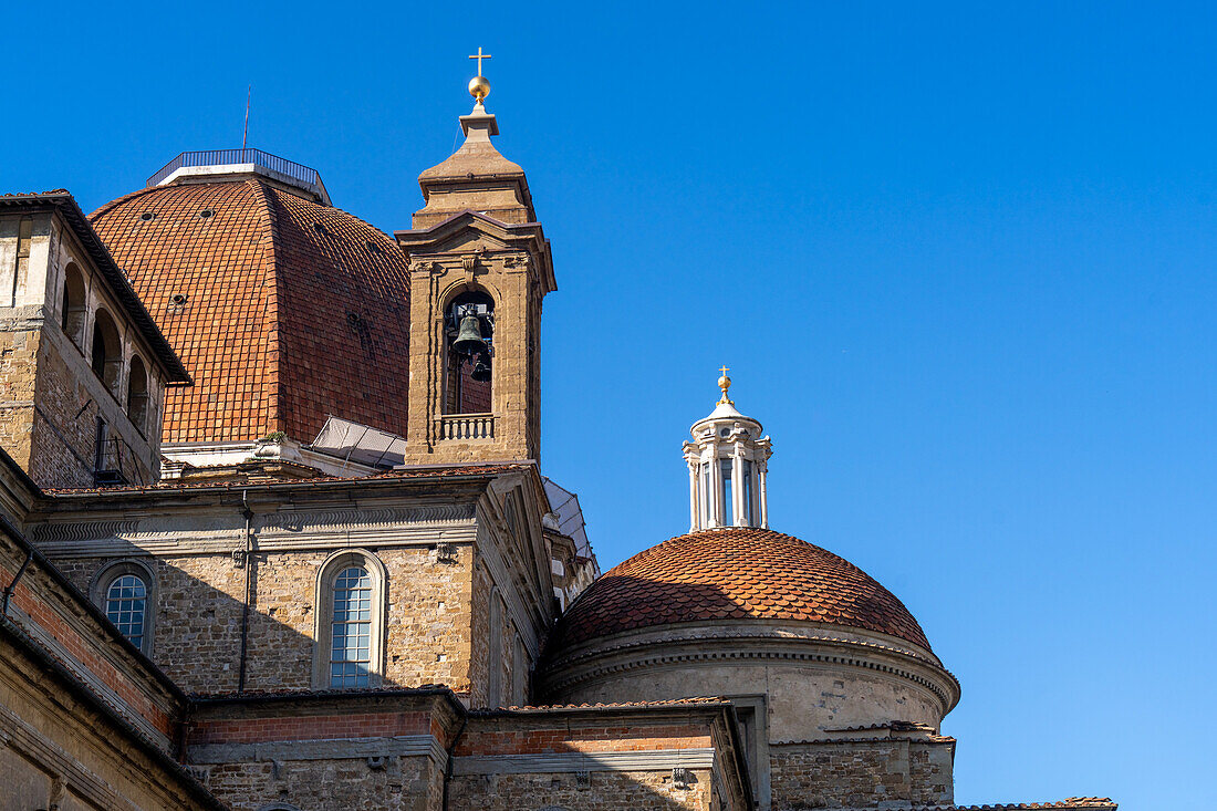 The domes of the Medici Chapel & bell tower of the Basilica di San Lorenzo in Florence, Italy.