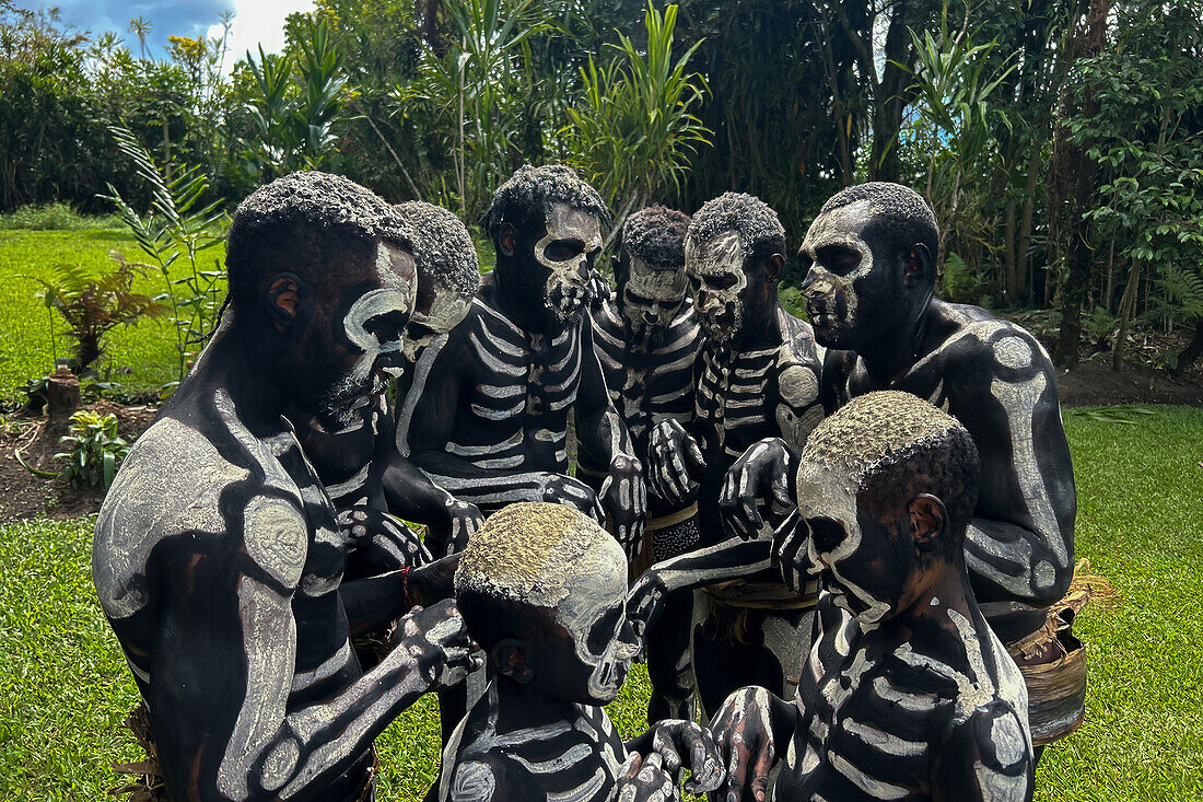 The Skeleton Men from the Omo Bugamo tribe of Papua New Guinea paint their bodies with black and white paint emulating the human skeleton, Chimbu Province, Papua New Guinea