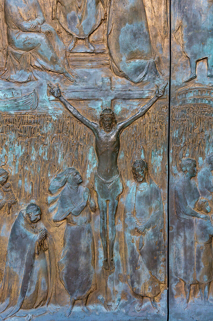 Detail of the gilded bronze Holy Door of the Basilica of St. Paul Outside the Walls, Rome, Italy. The Holy Door is opened only on Jubilee years.