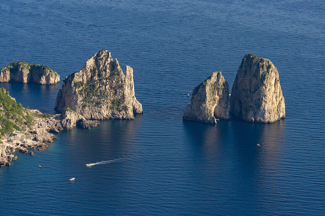 The Farallon Islands or faraglioni, sea stacks off the coast of the island of Capri, Italy, viewed from Monte Solaro.