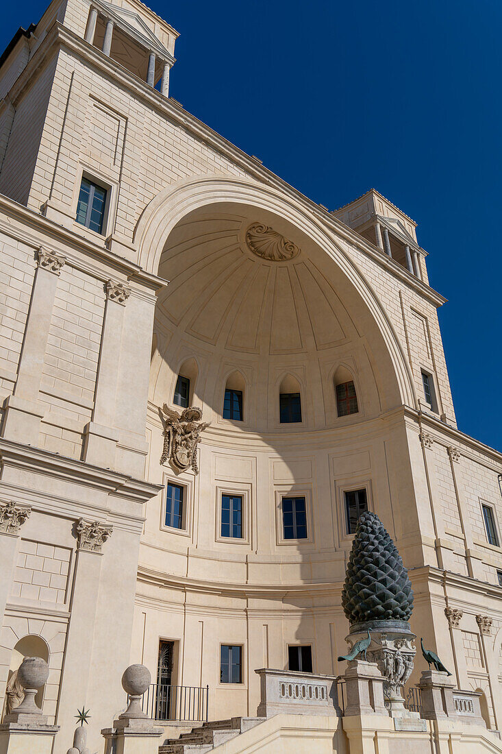 Bronze pinecone sculpture in front of the Terrace of the Niche, Vatican Museums, Vatican City, Rome, Italy.