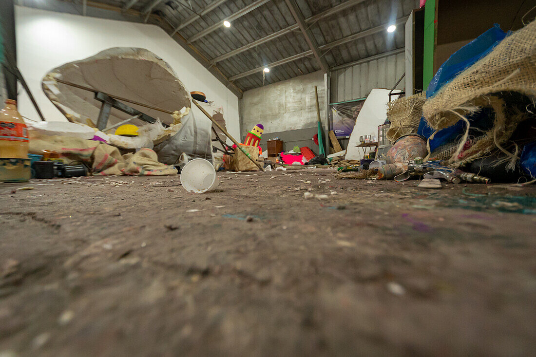 In the workshop, just a few hours before the parade, artisans fine-tune the last details and carry out the final assembly of their floats and individual costumes, preparing these magnificent works for the Great Parade of the Black and White Carnival. Pasto, Nariño, Colombia. January 5, 2025.