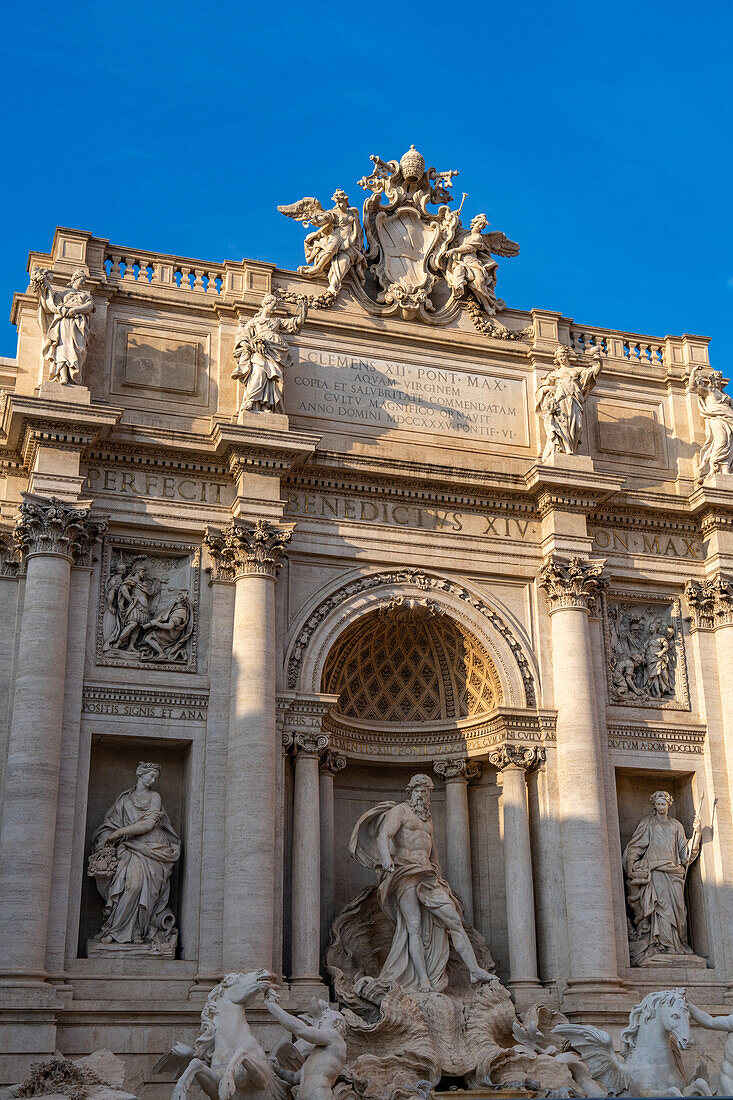 The Trevi Fountain on the rear of the Palazzo Poli in the Piazza di Trevi in Rome, Italy.