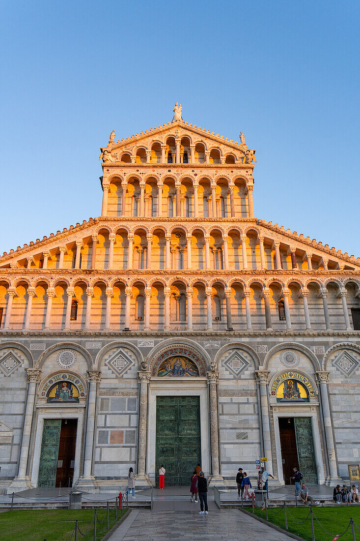 The west facade of the Pisa Duomo or Primatial Metropolitan Cathedral of the Assumption of Mary in Pisa, Italy.