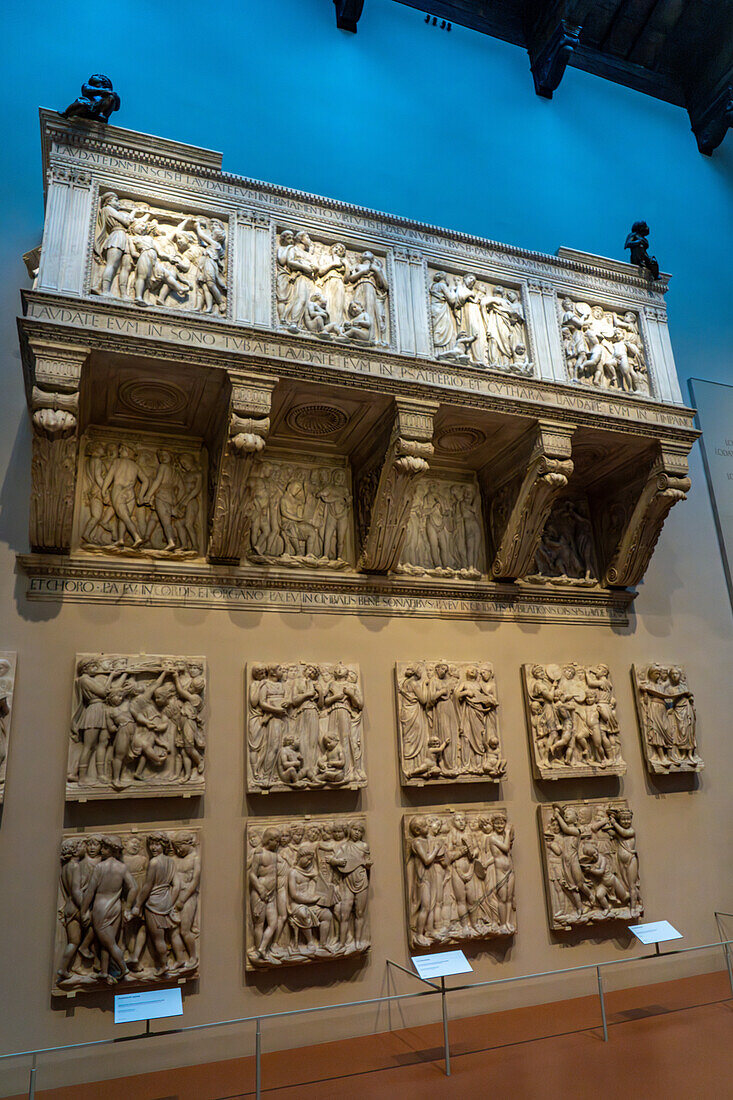 A carved marble singing gallery by Lucca della Robbia in the Duomo Museum in Florence, Italy. Original components were carved in the 15th Century but were combined to make this gallery in the 19th Century.