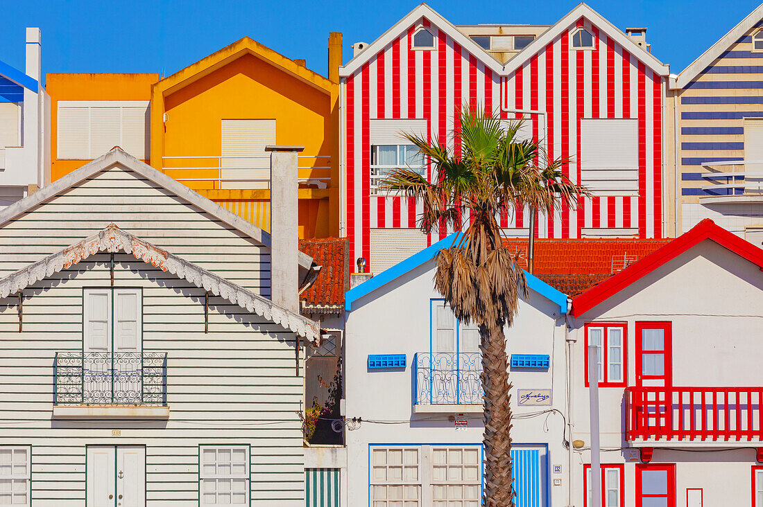 Brightly painted beach homes, Costa Nova do Prado, Aveiro, Portugal, Europe