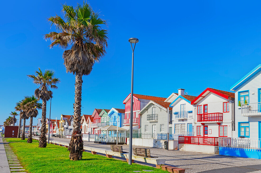 Brightly painted beach homes, Costa Nova do Prado, Aveiro, Portugal, Europe