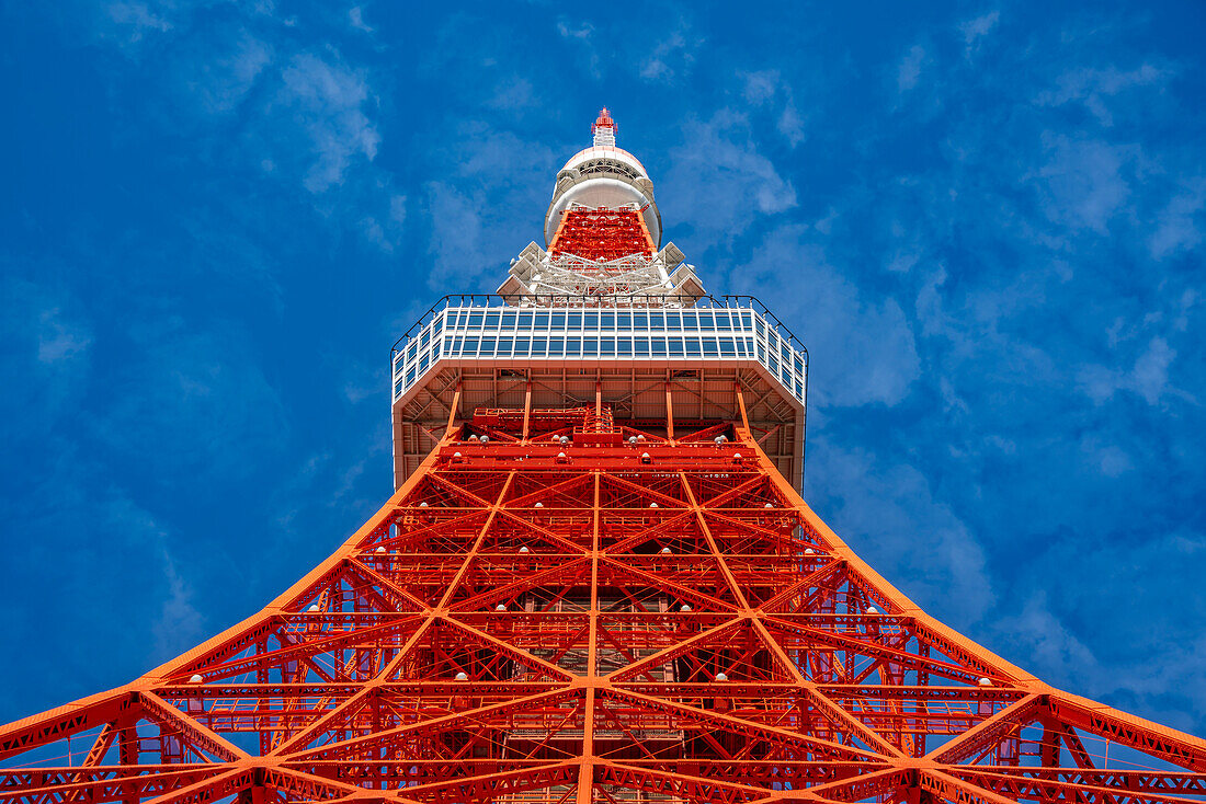 View of Tokyo Tower from its base against blue sky, Shibakoen, Minato City, Tokyo, Honshu, Japan