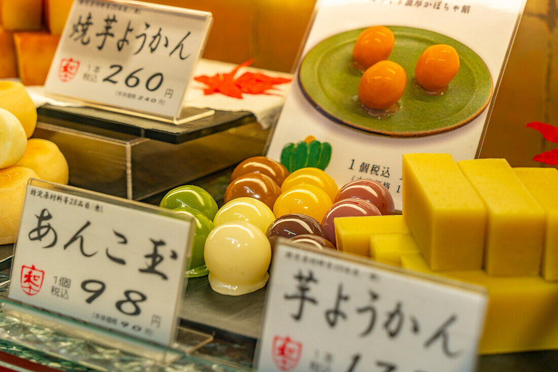 View of traditional Japanese sweets in shop window, Asakusa, Taito City, Tokyo, Honshu, Japan