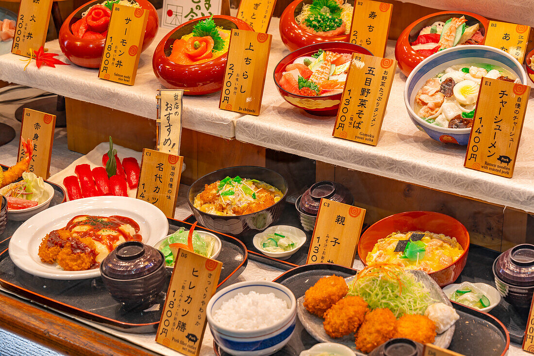 View of traditional Japanese dishes on display in shop window, Asakusa, Taito City, Tokyo, Honshu, Japan