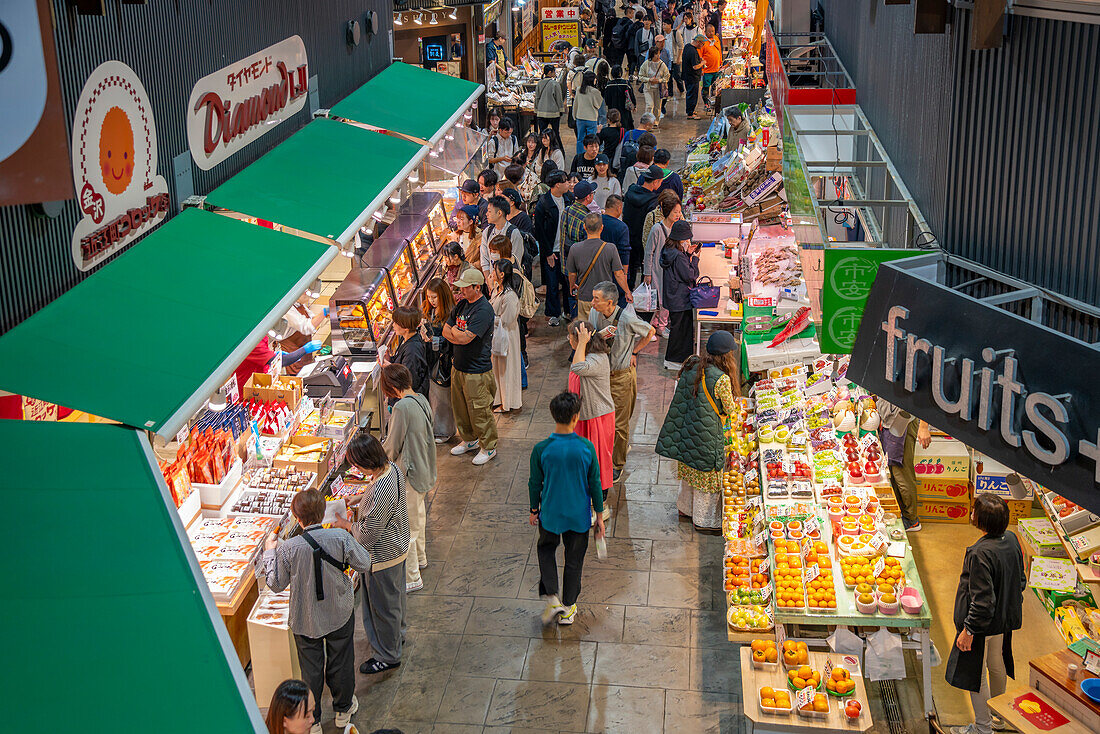 Elevated view of stalls and people in Omicho Market, Kanazawa City, Ishikawa Prefecture, Honshu, Japan