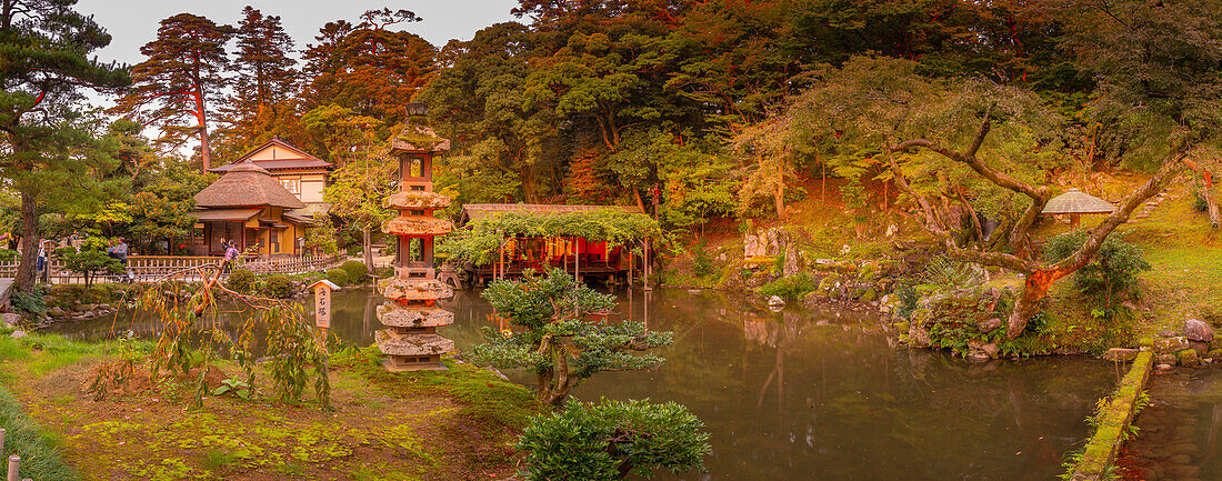 View of Hisago-ike Pond and Kaiseki Pagoda in Kenrokumachi Japanese Garden, Kanazawa City, Ishikawa Prefecture, Honshu, Japan