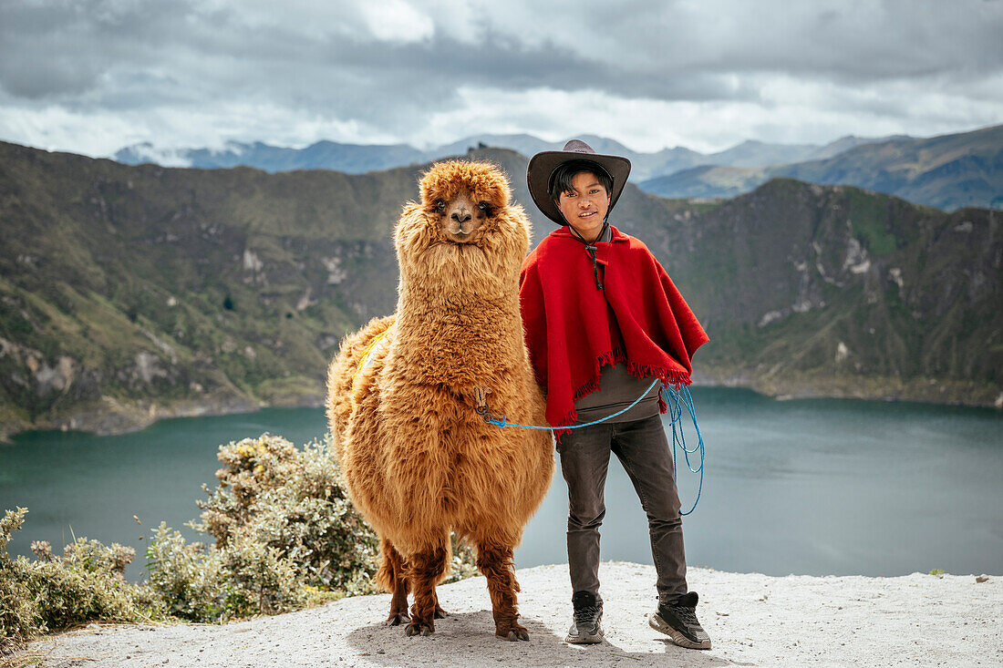 Portrait of Jefferson Herrera with his Alpaca, Quilotoa Lake, Cotopaxi Province, Ecuador