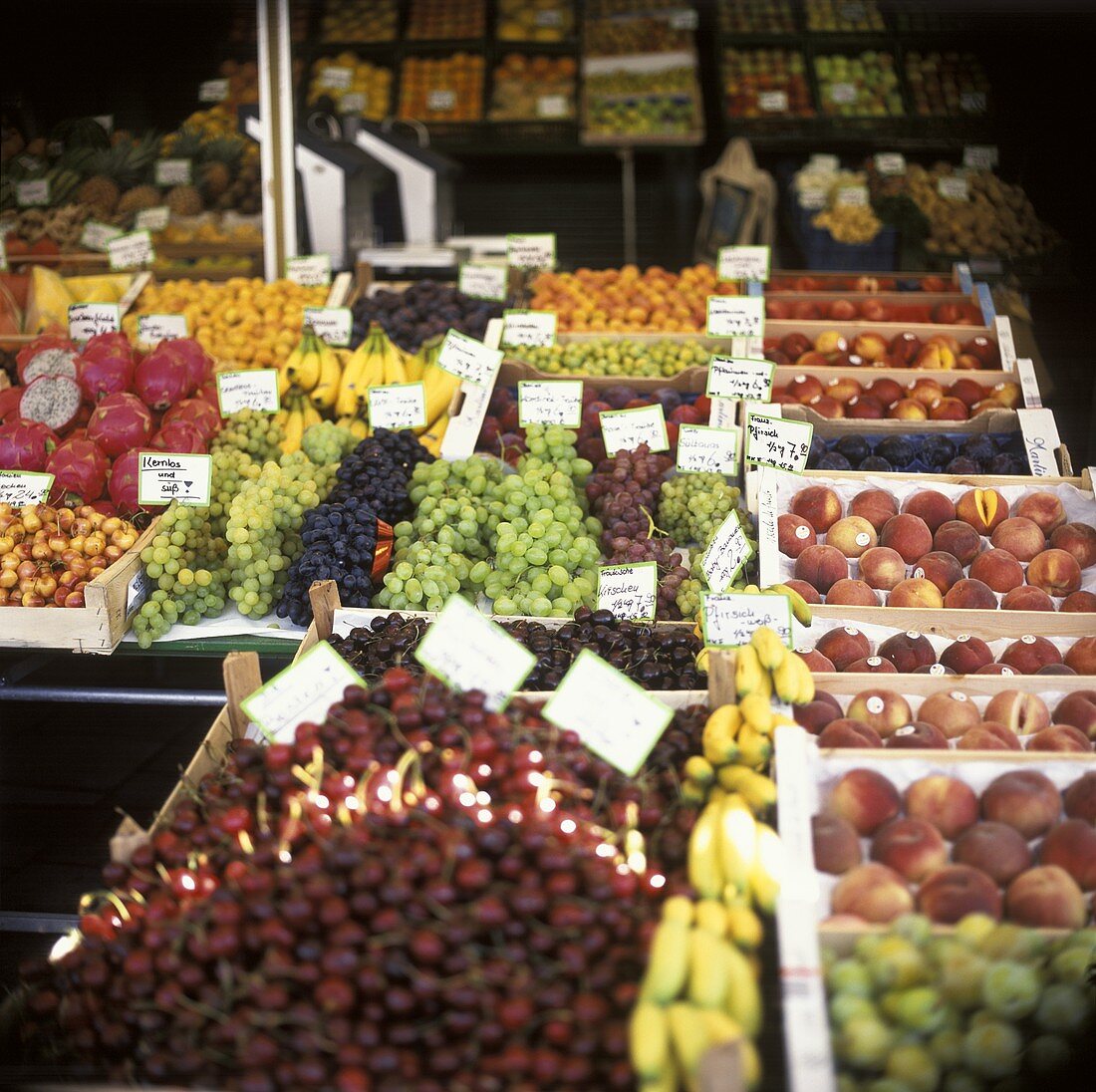 Fruit in crates on a market stall