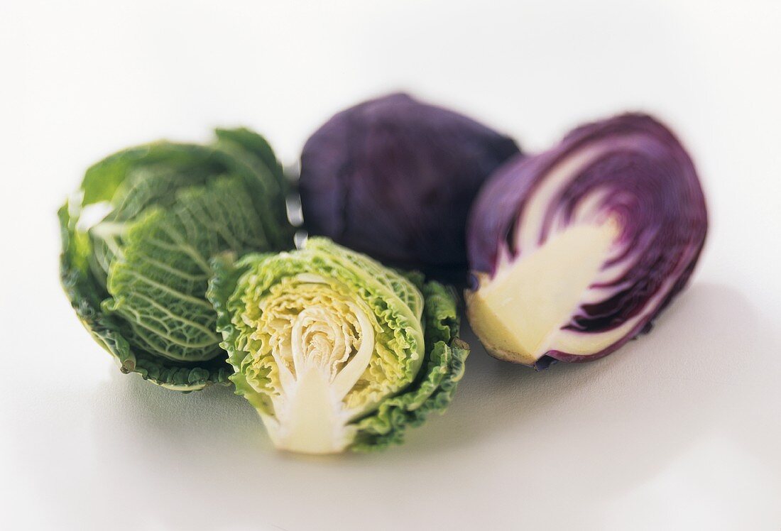 Mini-savoy and mini-red cabbage, whole and halved
