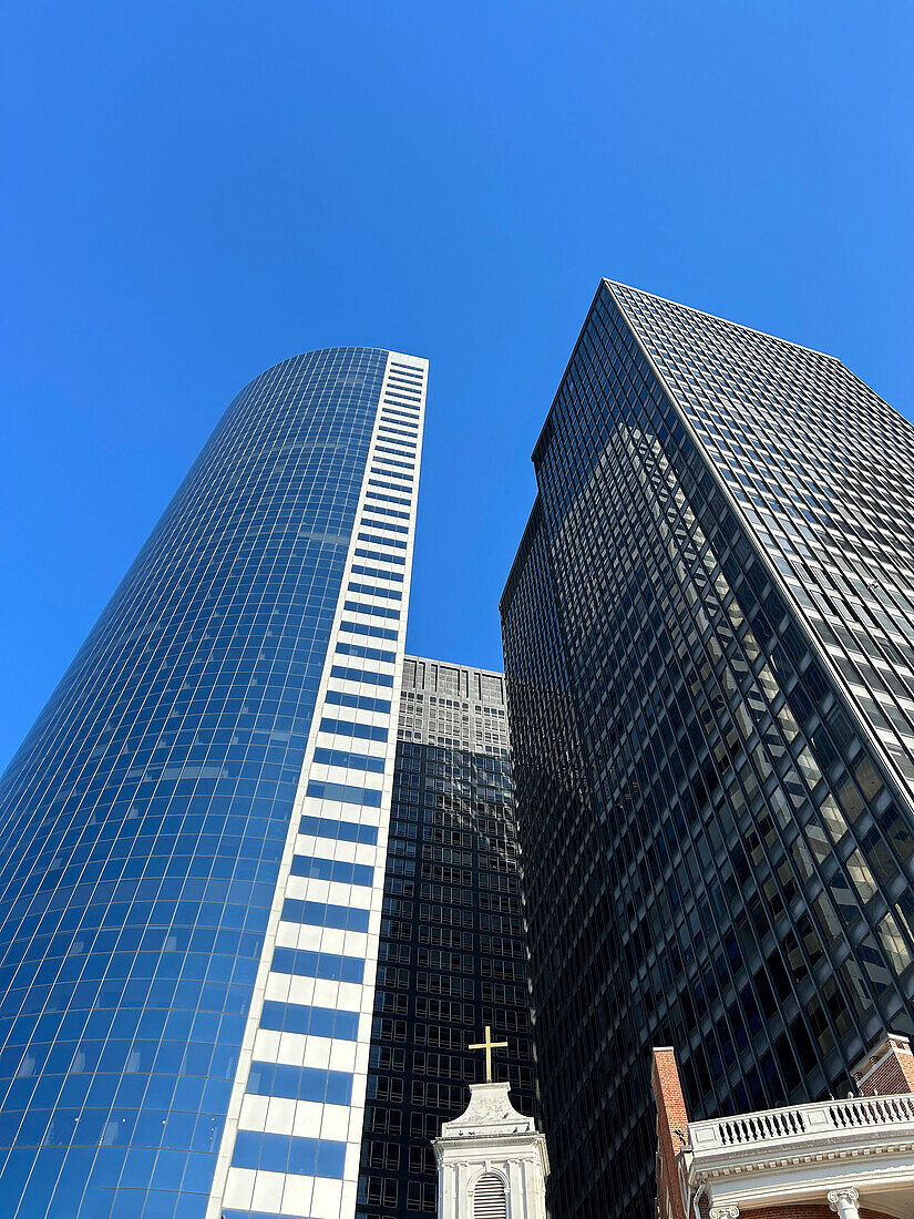 Low angle view of two modern skyscrapers, Financial District, New York City, New York, USA