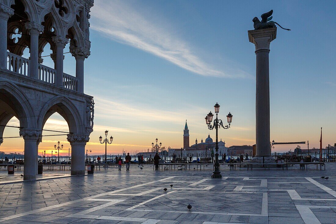 Italy, Veneto, Venice listed as World Heritage by UNESCO, San Marco district, Saint Mark's tiny Square (Piazzetta San Marco), the Palazzo Ducale (Doge's palace), the column headed with the Lion of Venice, the basilica and abbey church of San Giorgio Maggiore in the background