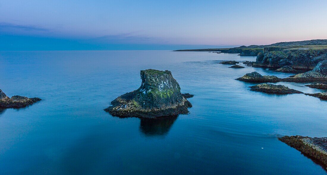 Iceland, Western Region, Grundafjordur, Arnarstapi, Snaefelness cliffs at sunset