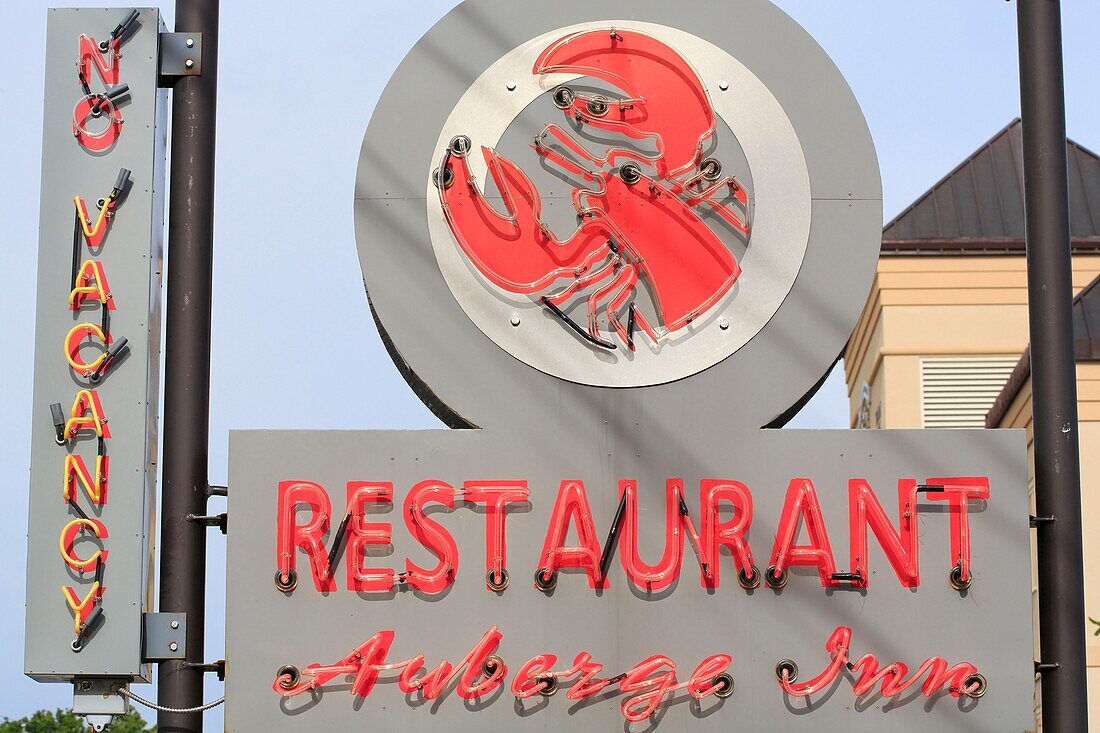 Canada, New Brunswick, Acadie, Westmorland County, Shediac (self-proclaimed world capital of lobster), Gabriele restaurant, neon with lobster for restaurant