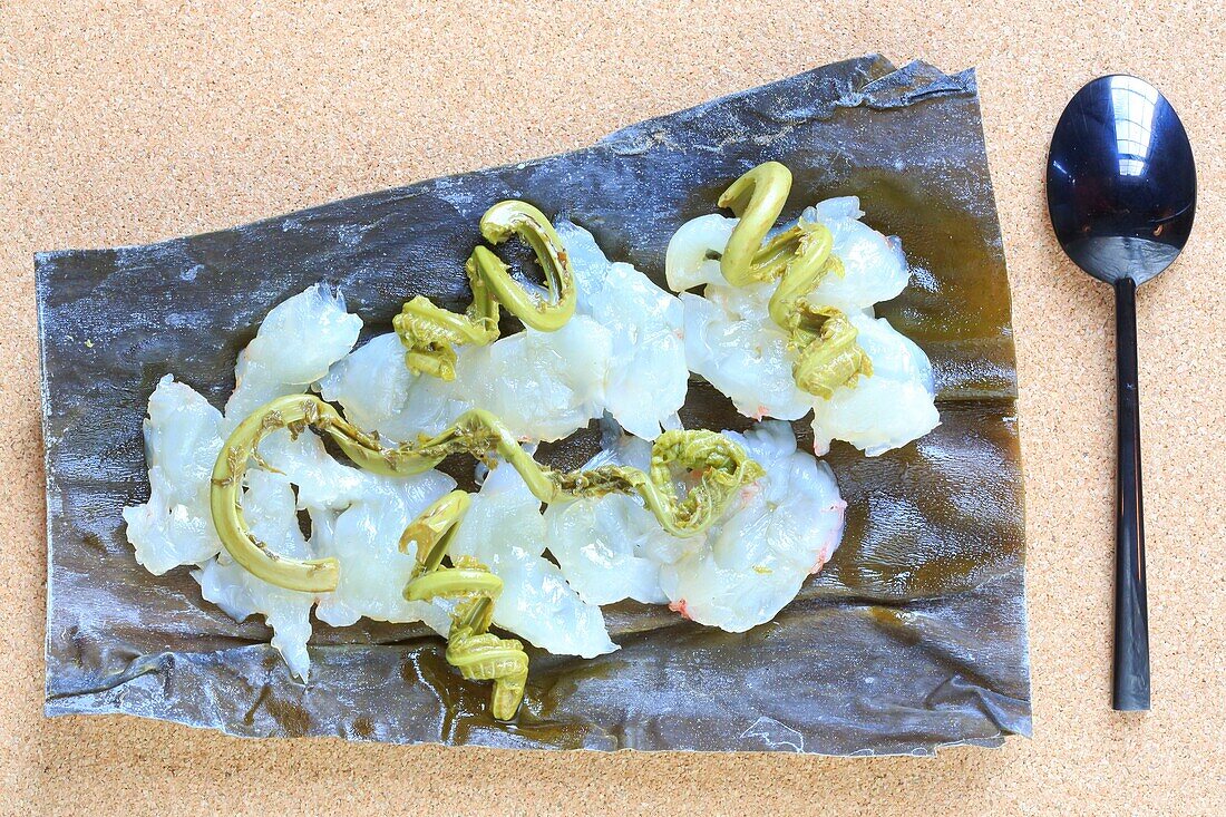 Canada, New Brunswick, St. John's County, Saint John (Saint John), Saint John Ale House Restaurant, raw lobster on a bed of seaweed (chef Jesse Vergen)