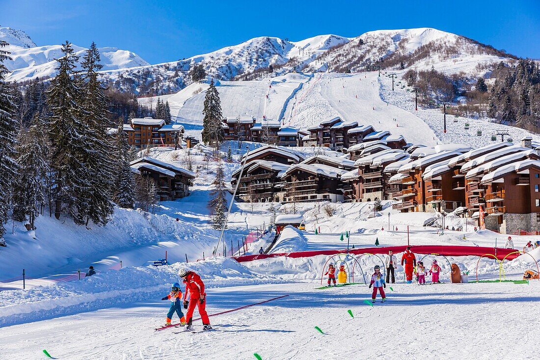 France, Savoie, Valmorel, Tarentaise valley, massif of the Vanoise, view of the Cheval Noir (2832m) and the chairlift the Altispace since the kindergarten