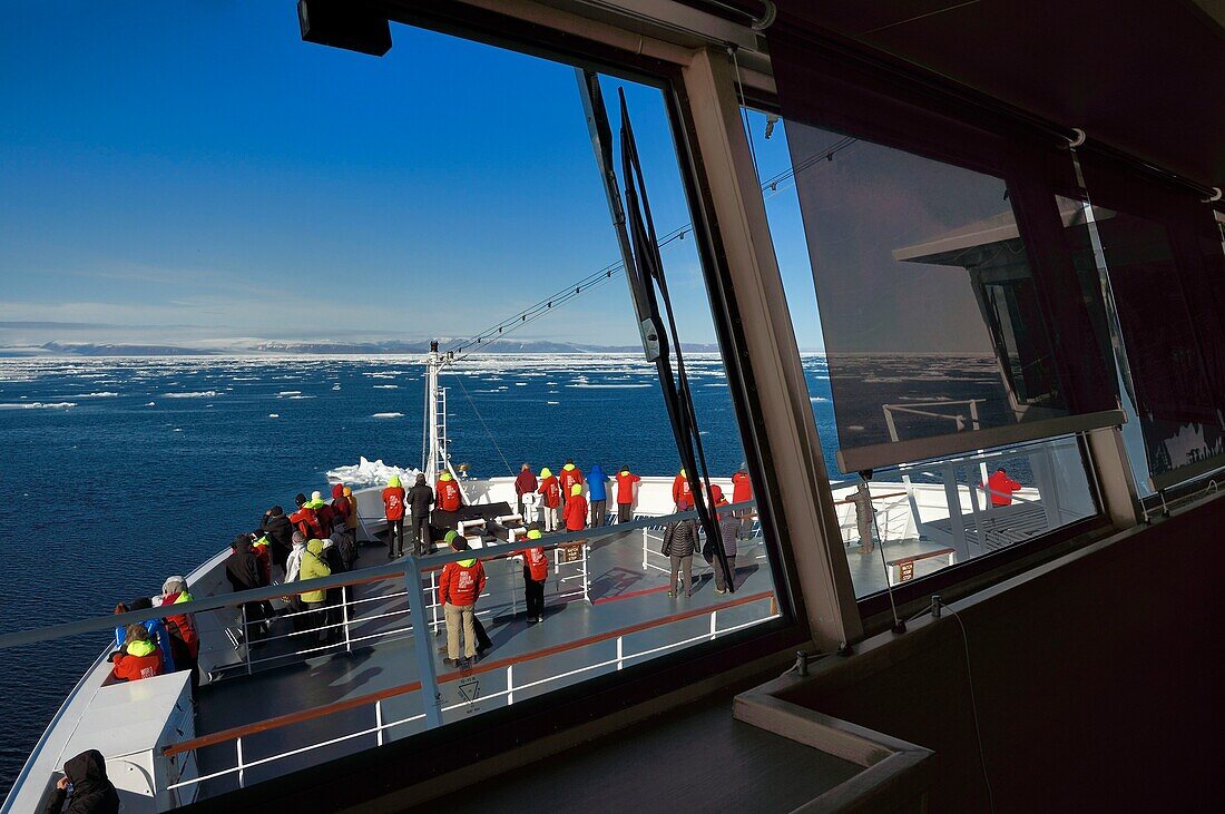 Greenland, North West coast, Smith sound north of Baffin Bay, MS Fram cruse ship from Hurtigruten next to the Arctic sea ice evolving between Greenland and Canada