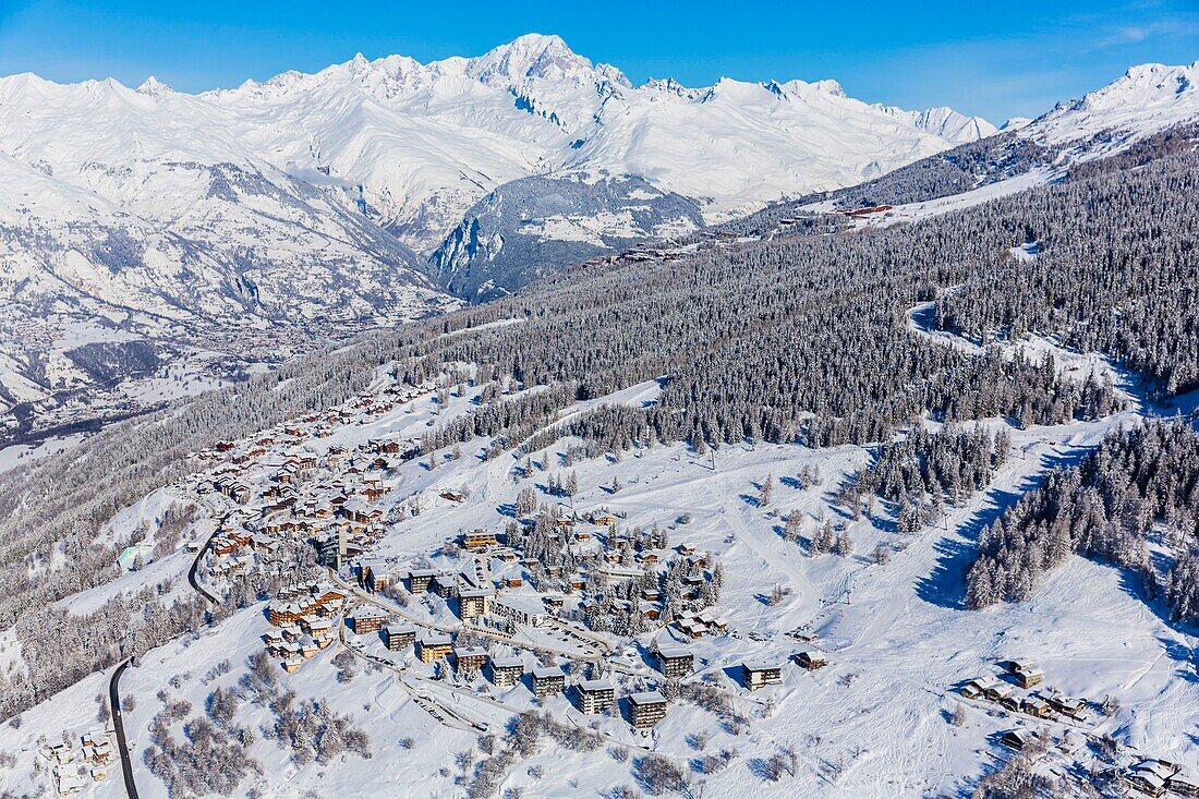 France, Savoie, Vanoise massif, valley of Haute Tarentaise, Peisey-Nancroix, Peisey-Vallandry, part of the Paradiski area, view of the Mont Blanc (4810m), Les Arcs and Bourg-Saint-Maurice (aerial view)
