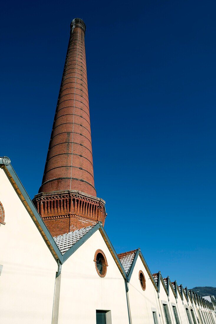 France, Vosges, Fraize, place called Avelines, Rue des Aulnes, former spinning of Alders, sheds, chimney of the coal boiler high of 67 m, built in 1891